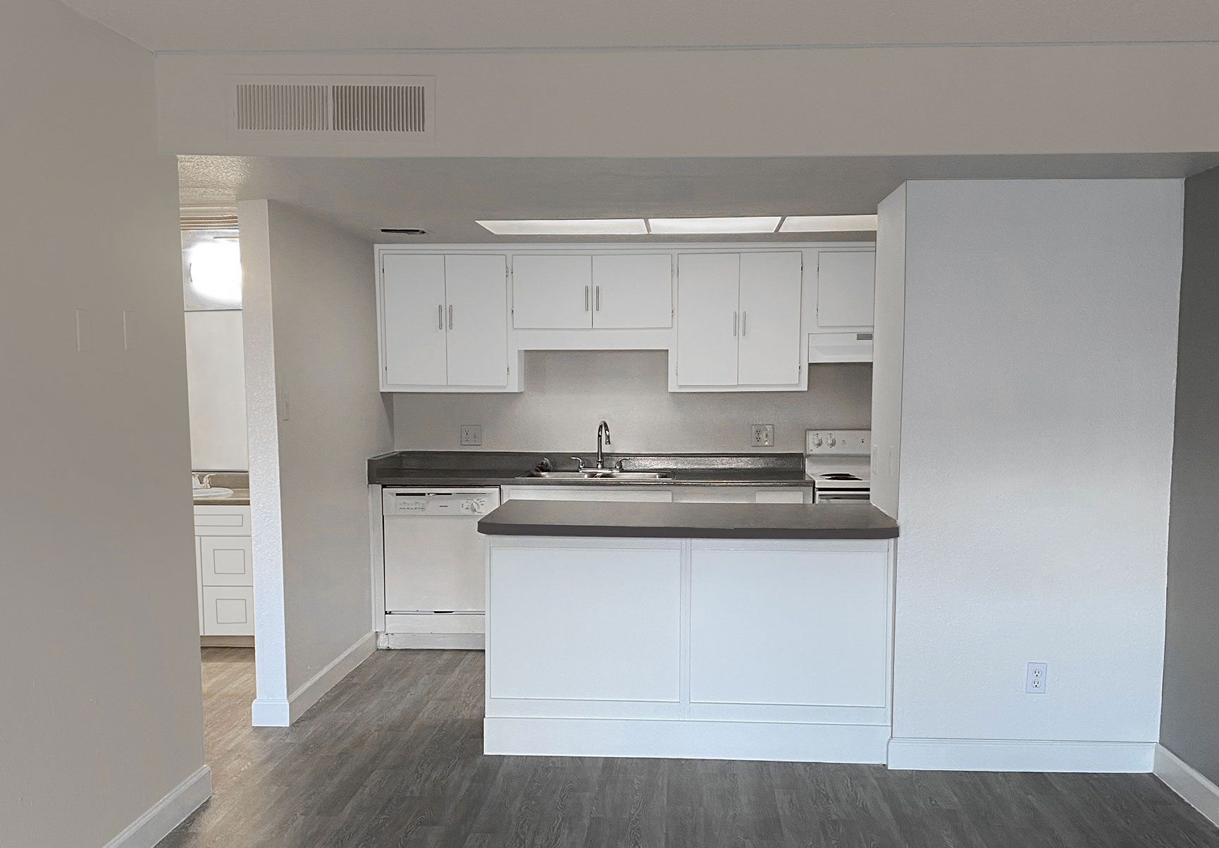 This image shows the entrance of one of Woodbridge Apartment Homes units